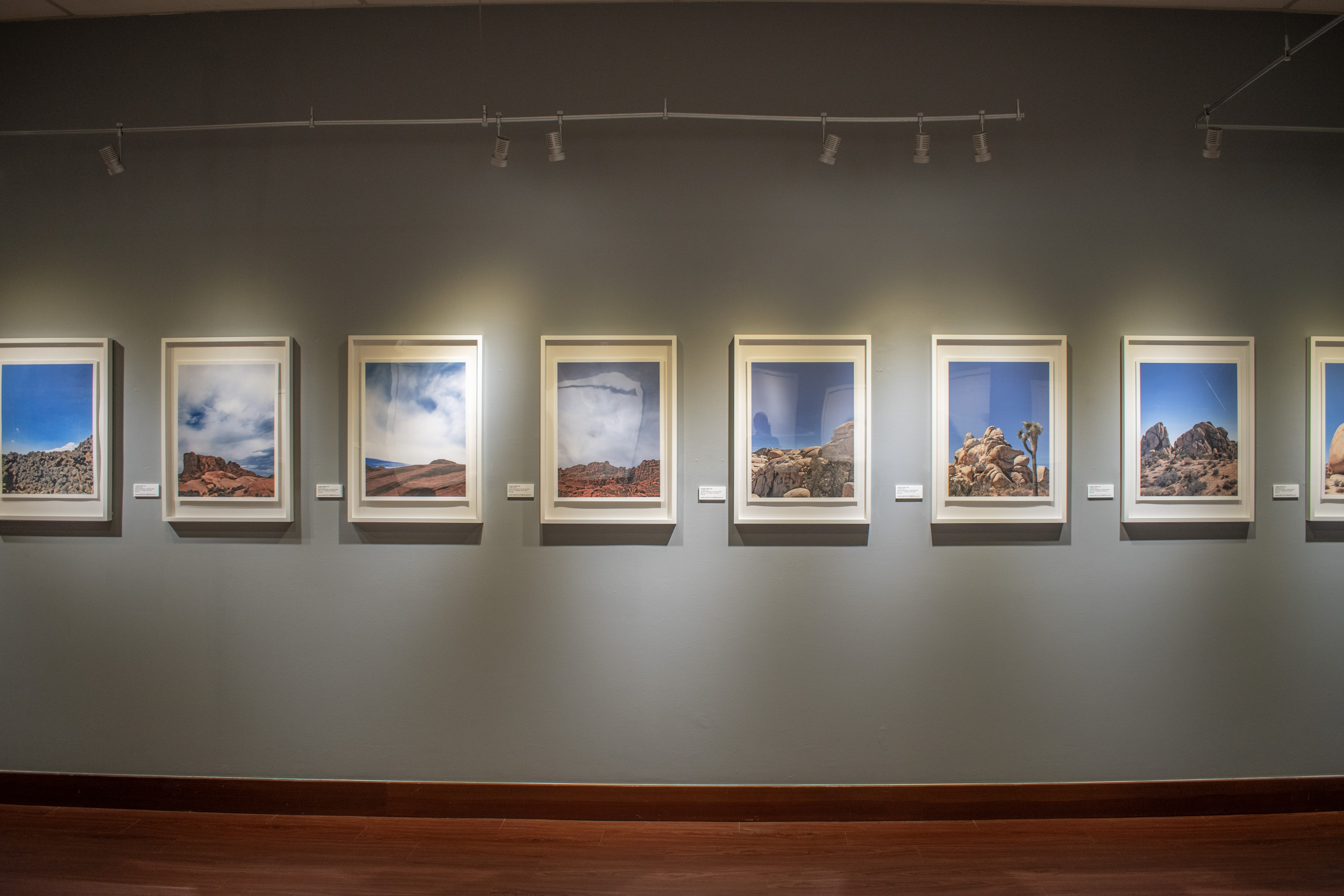 Photograph of the east wall of the gallery displaying Crystal Yachin Lee's artwork.